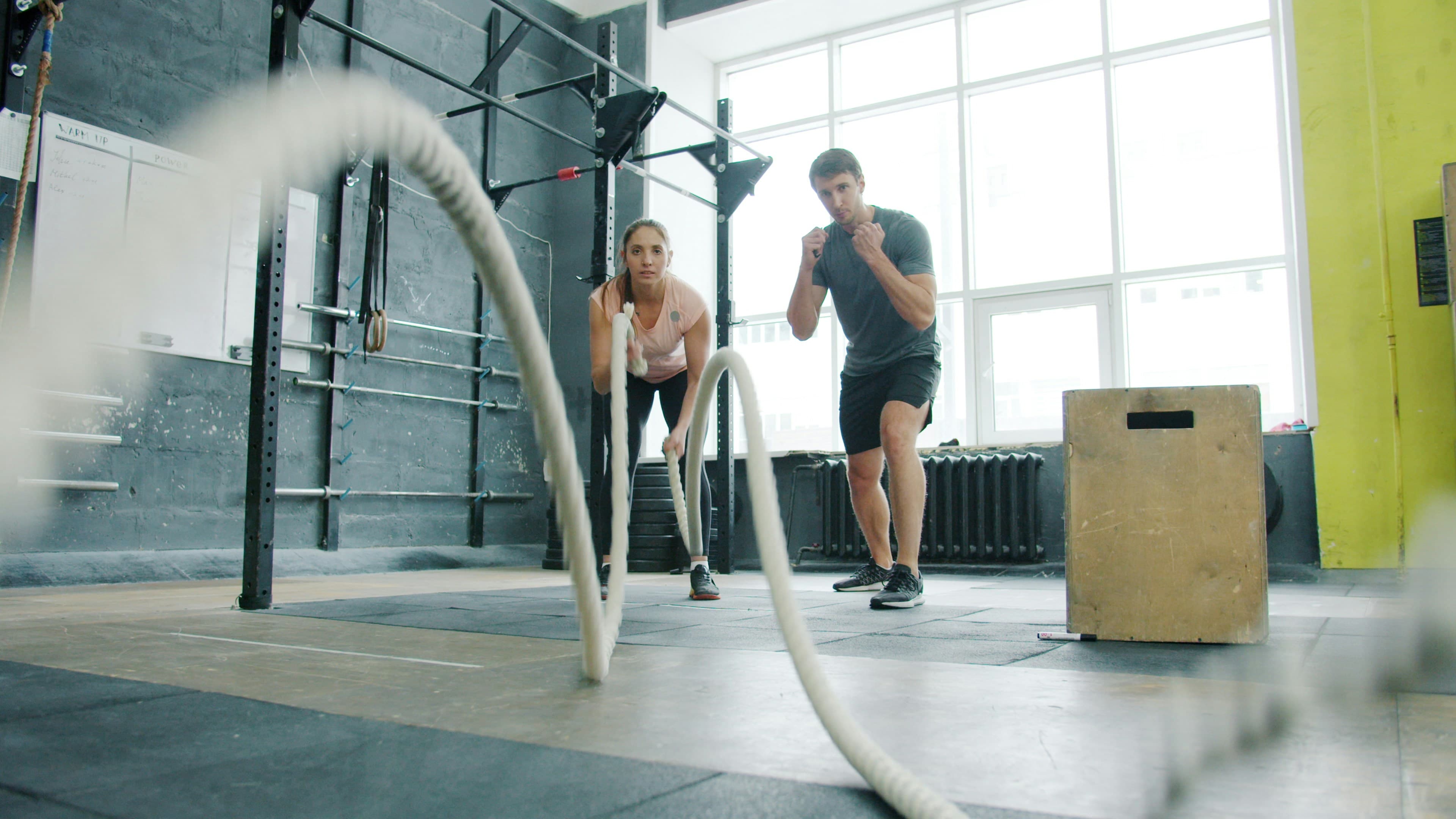 Man performing dips at a gym